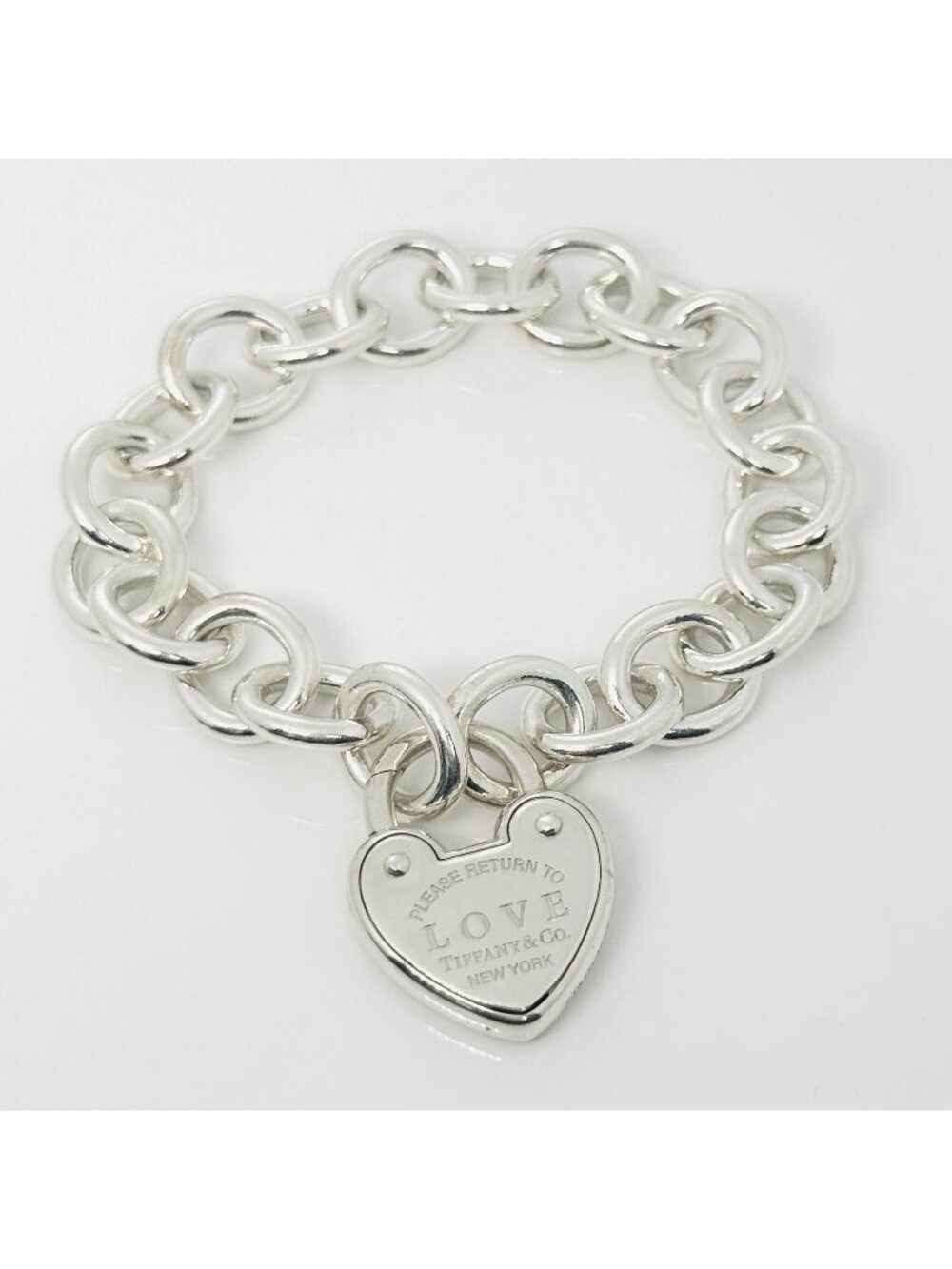 Return to Tiffany & Co. Love Heart Tag Padlock Charm Bracelet in 925 Silver